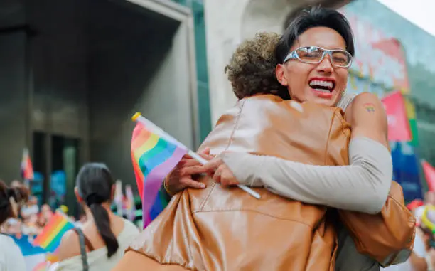 Couples celebrating at Pride